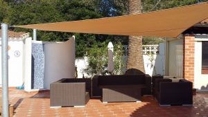 Seating area under shade sail